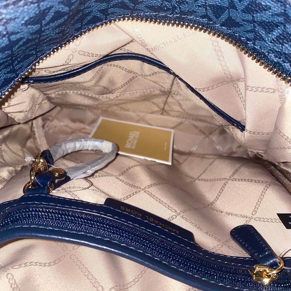 Michael Kors MK Blue Rhea Backpack, Tri-Fold Wallet, & Drawstring Bag Set - Picture 6 of 14